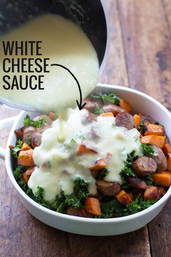 White cheese sauce drizzle on a dish of food.