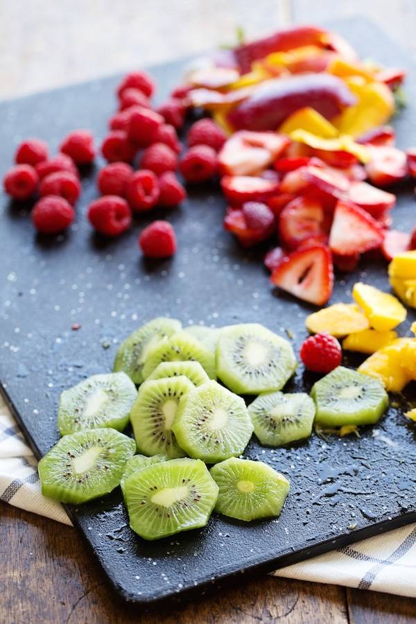 Fruit on a cutting board.