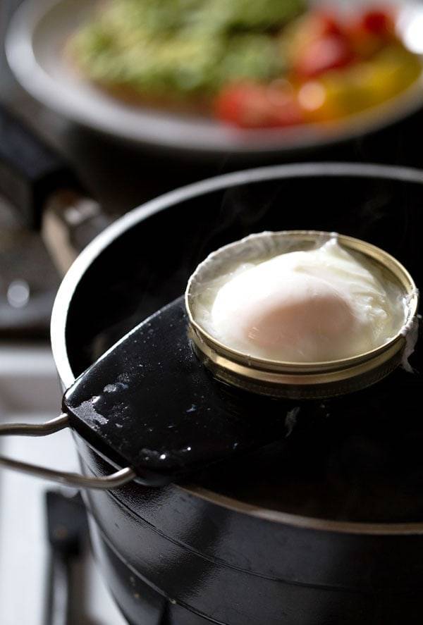 This Simple Poached Egg and Avocado Toast recipe is so simple and so delicious! Real, healthy food never tasted so good. YUM! | pinchofyum.com