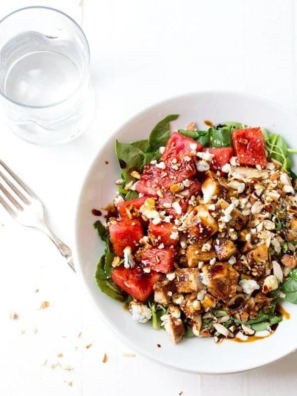 Chopped Watermelon Chicken Salad - blue cheese, watermelon, almonds, spinach, chicken, and a balsamic reduction. Like summer on a plate! 300 calories. | pinchofyum.com