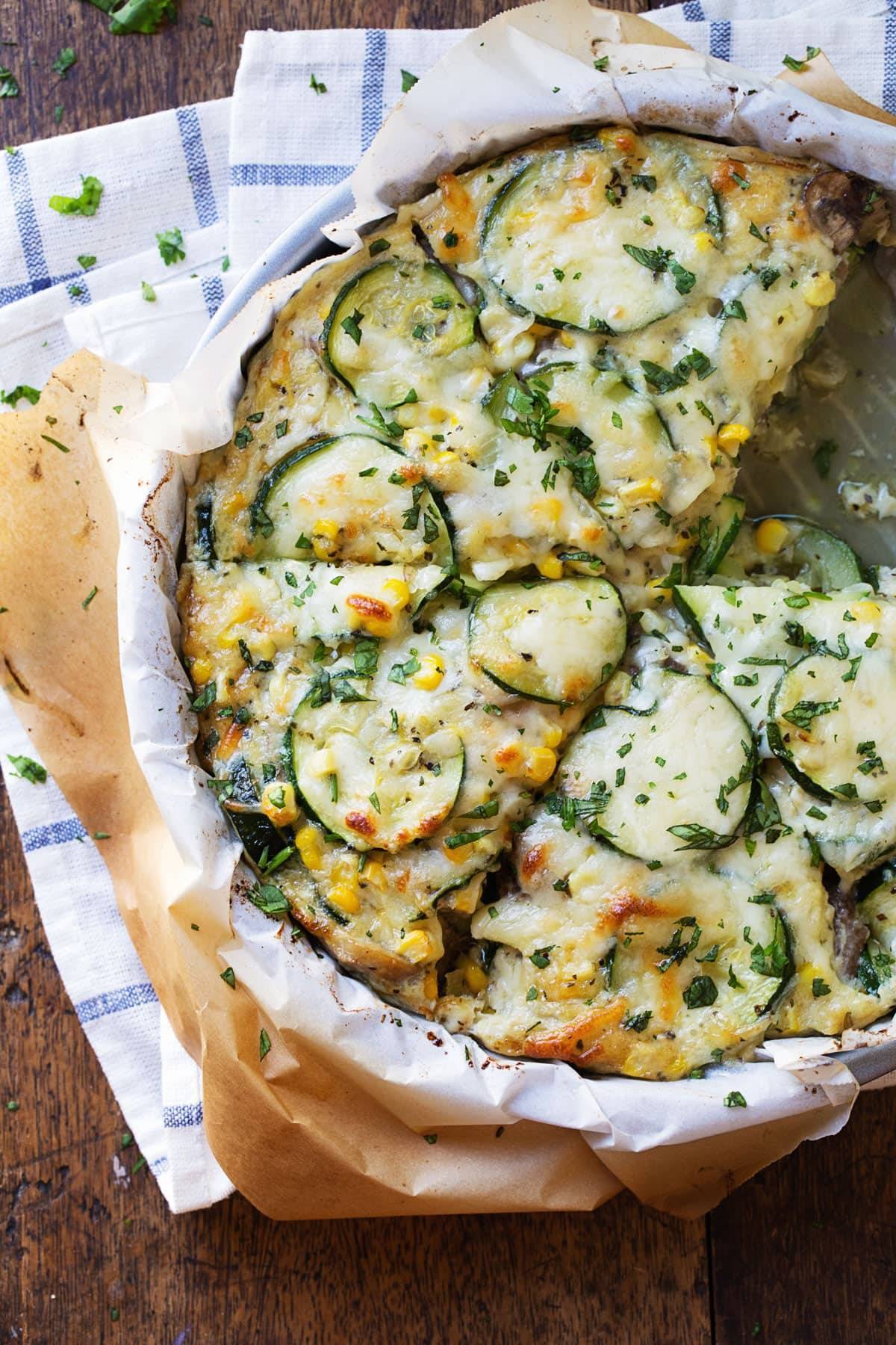 This crustless Sweet Corn and Zucchini Pie is so incredibly simple to make and it's the perfect way to enjoy summer produce! | pinchofyum.com