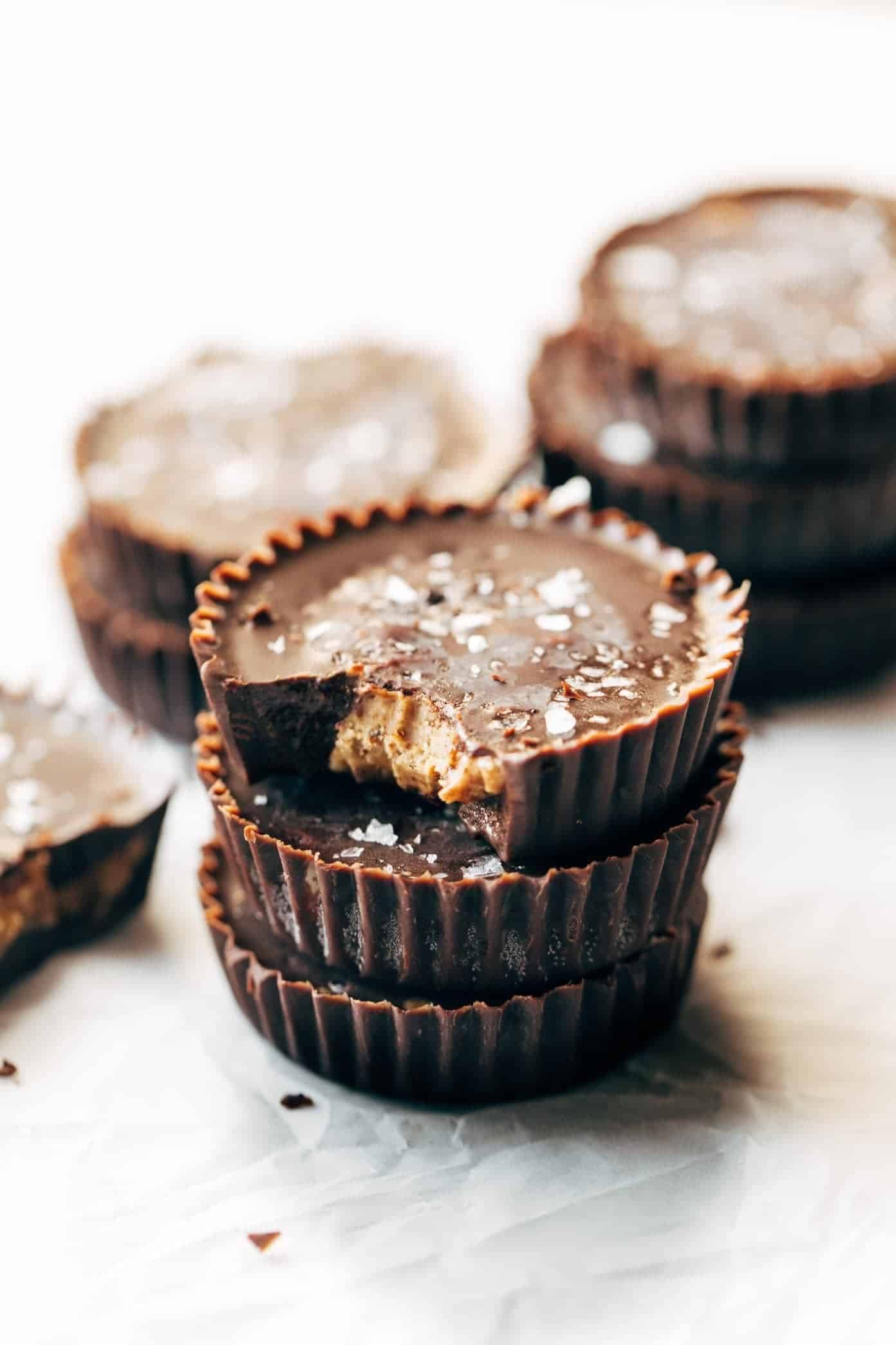 Almond butter cups with bite taken out.