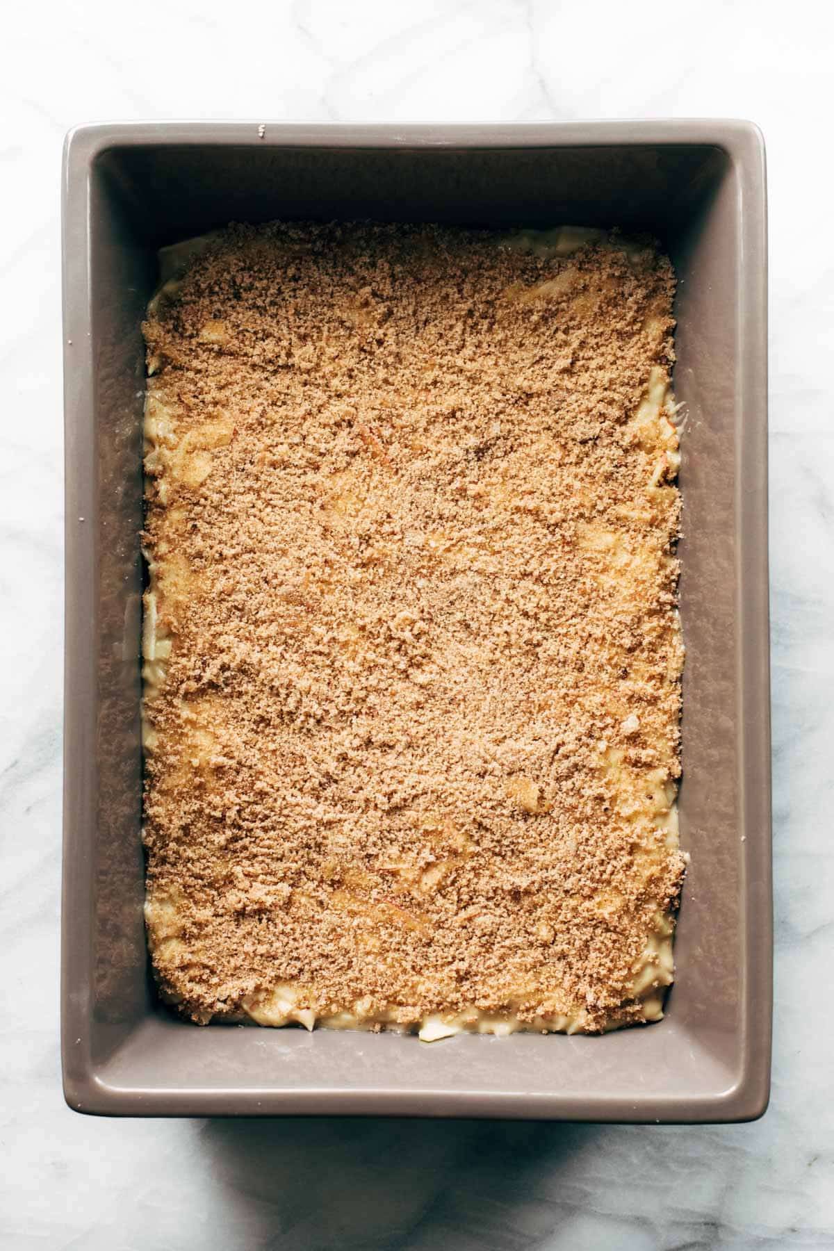 Cinnamon Sugar Apple Cake in a pan before baking.