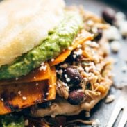 Arepas with sweet potato, carnitas, and black beans.