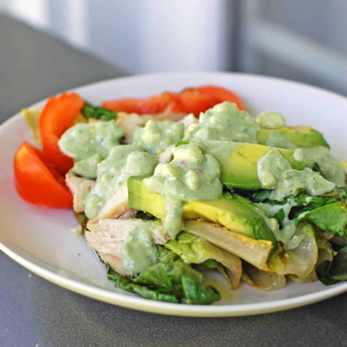 Avocado blue cheese dressing on grilled veggies.