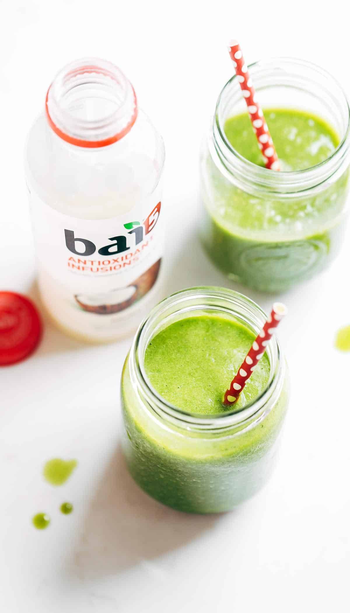 Coconut Green Smoothies in jars with straws.