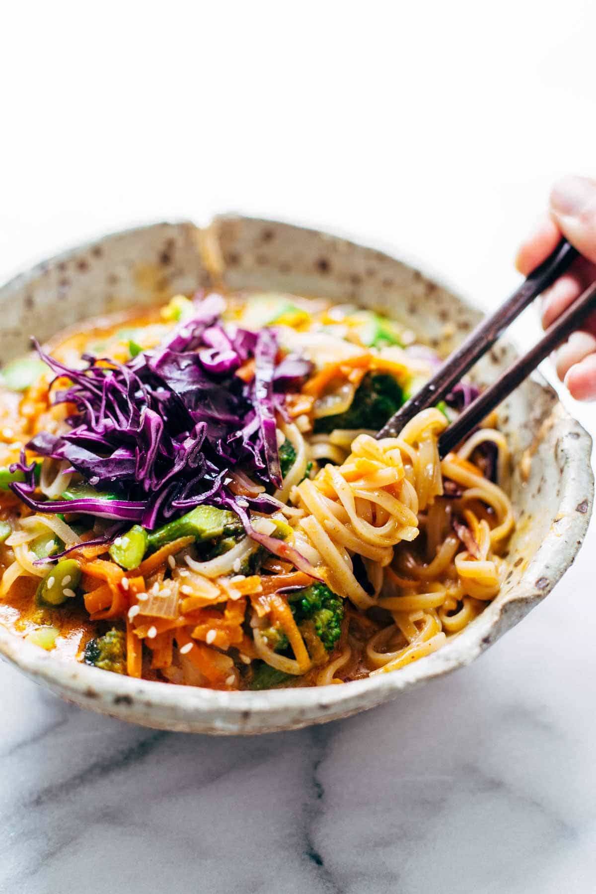 These Bangkok Coconut Curry Noodle Bowls with brown rice noodles are healthy and easy - can be made vegetarian, vegan, or gluten free! | pinchofyum.com