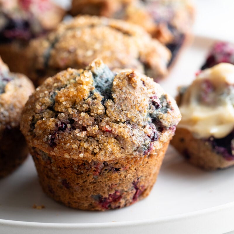 Berry muffins on a plate.