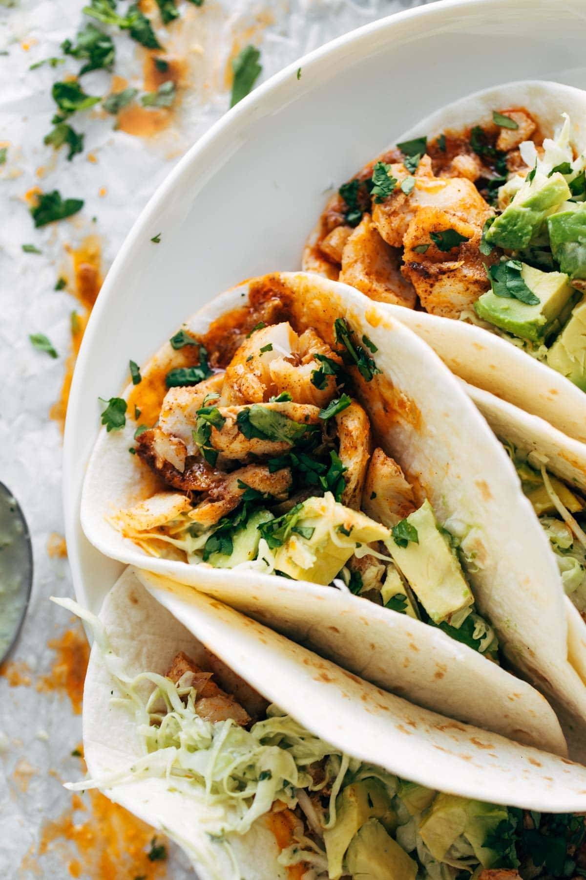 Tacos with fish and avocados.