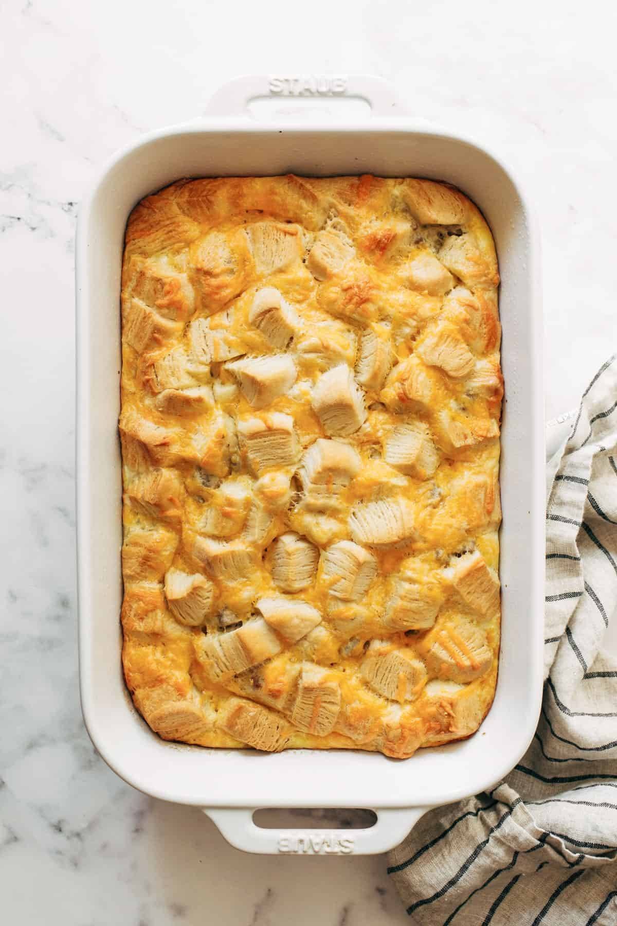 Biscuits and gravy egg bake in a casserole dish.