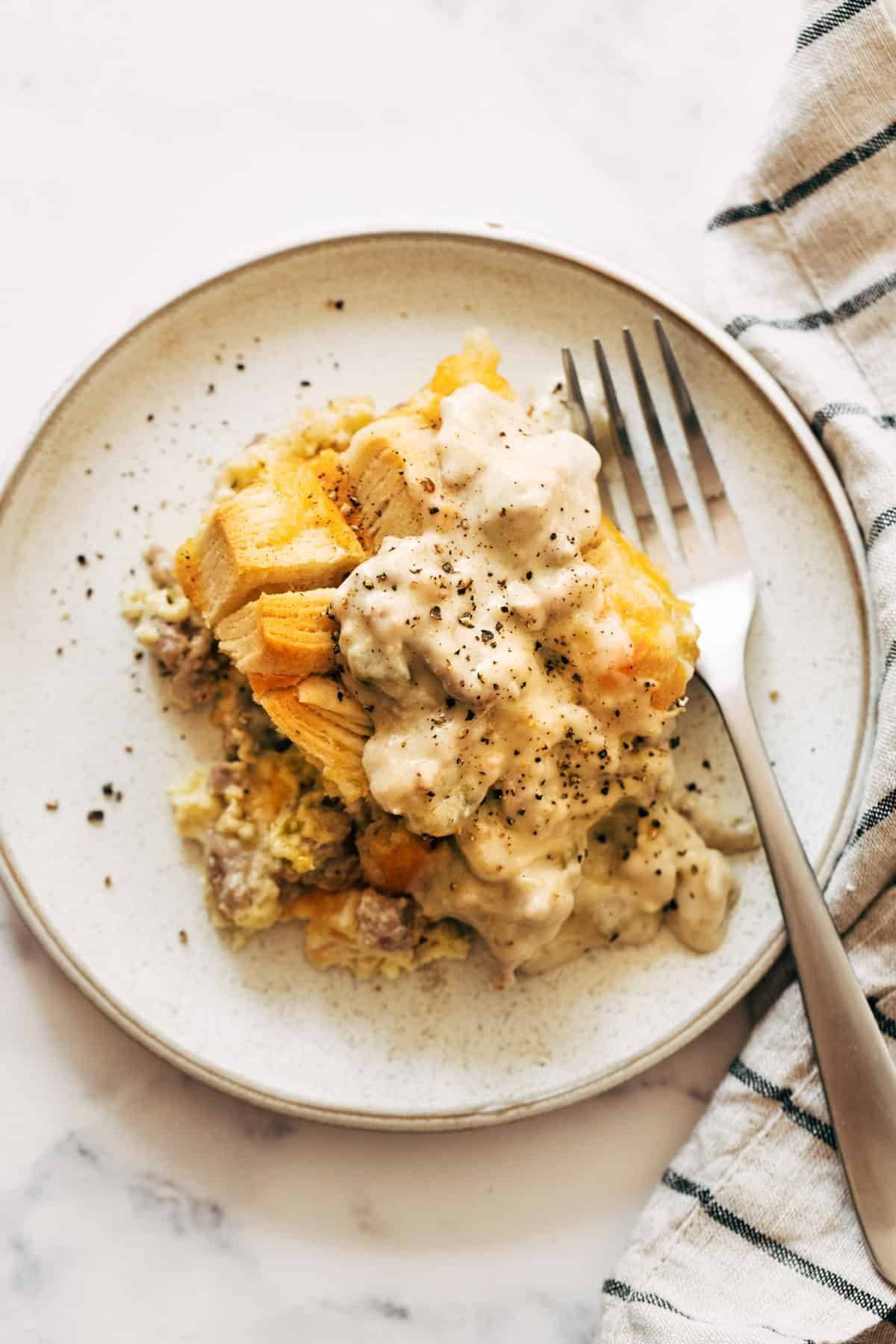 Biscuits and gravy egg bake on a plate.
