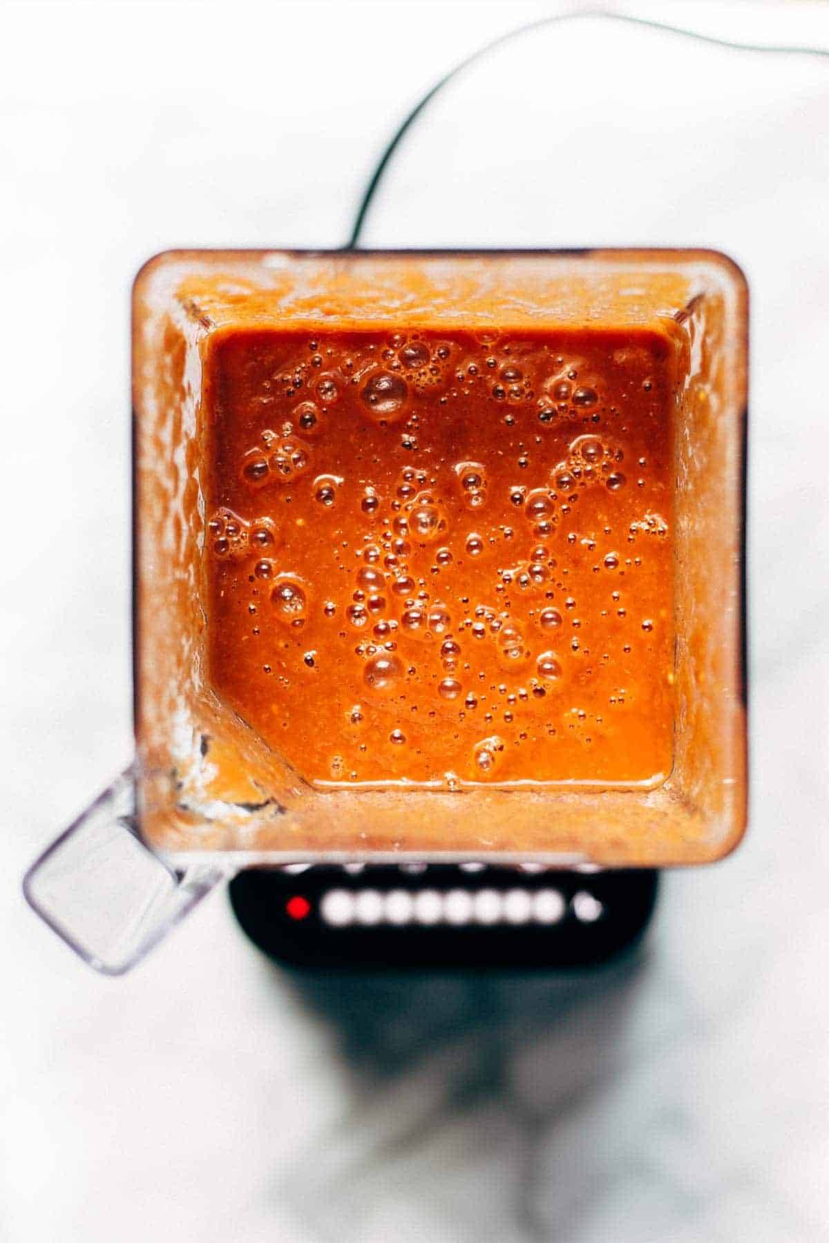 Enchilada sauce in a blender.
