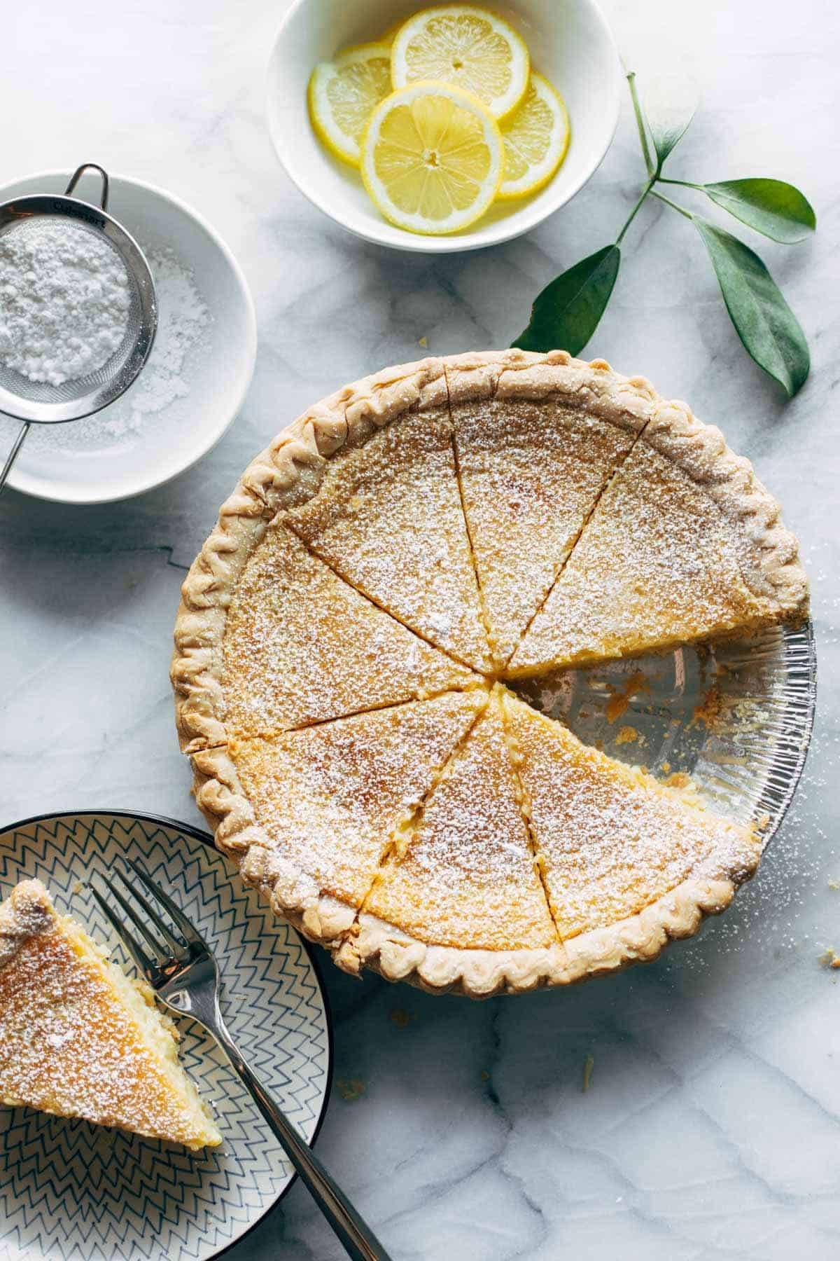 Lemon pie with powdered sugar.