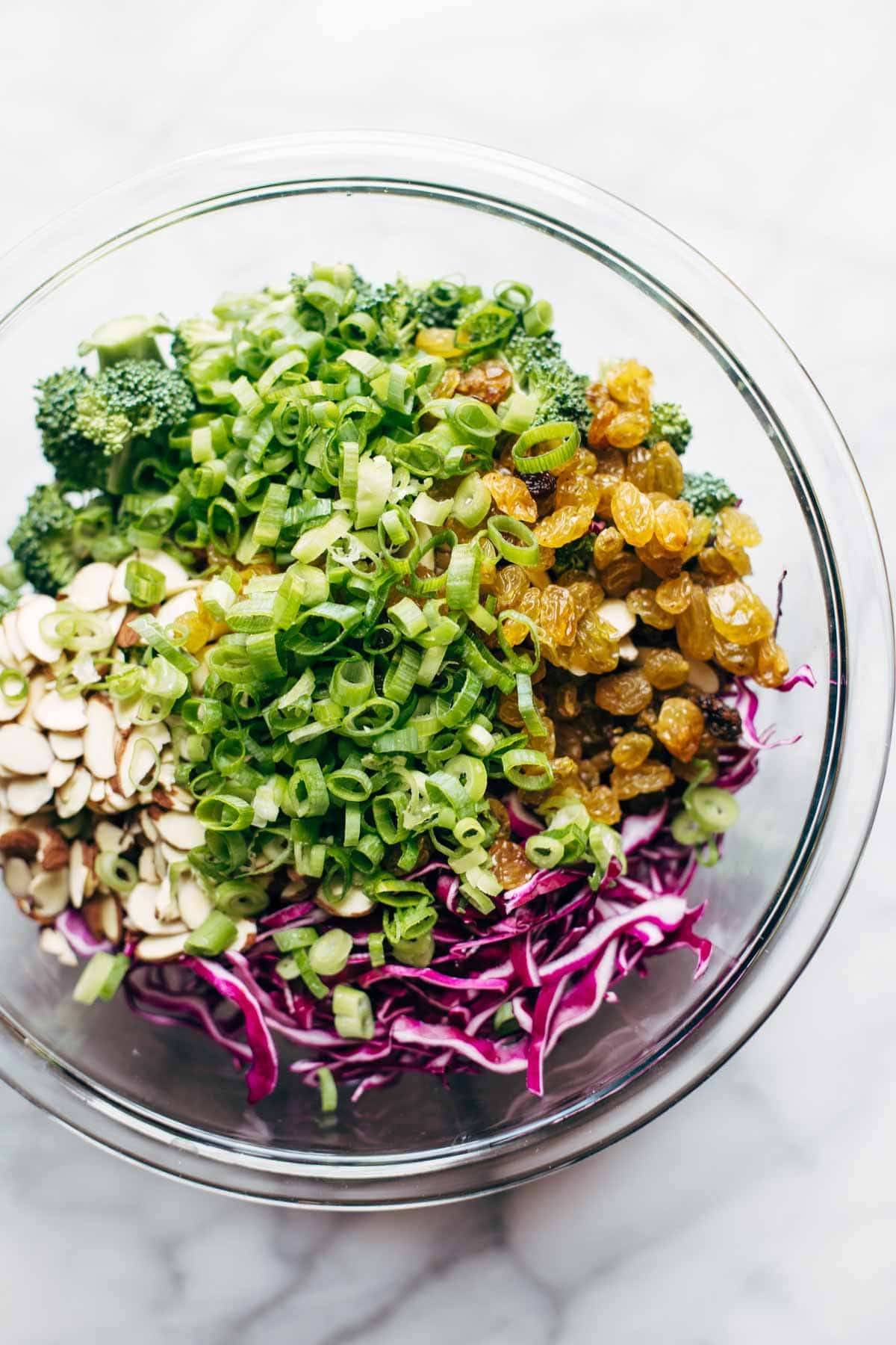 Super Clean Broccoli Salad With Creamy Almond Dressing Recipe Pinch Of Yum