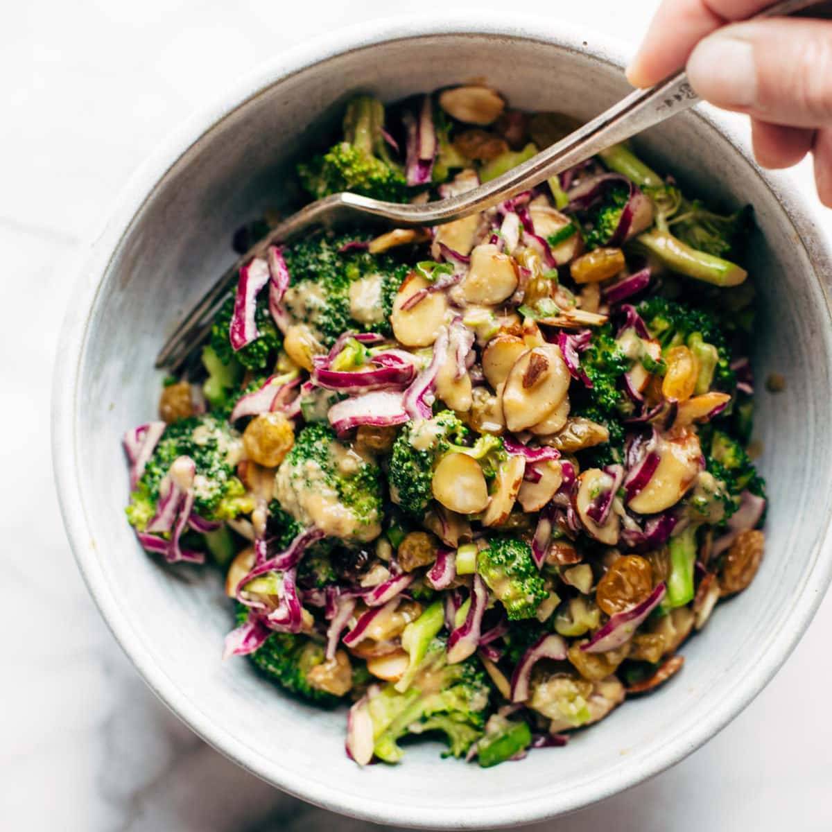 Clean Broccoli salad in a bowl with a fork.