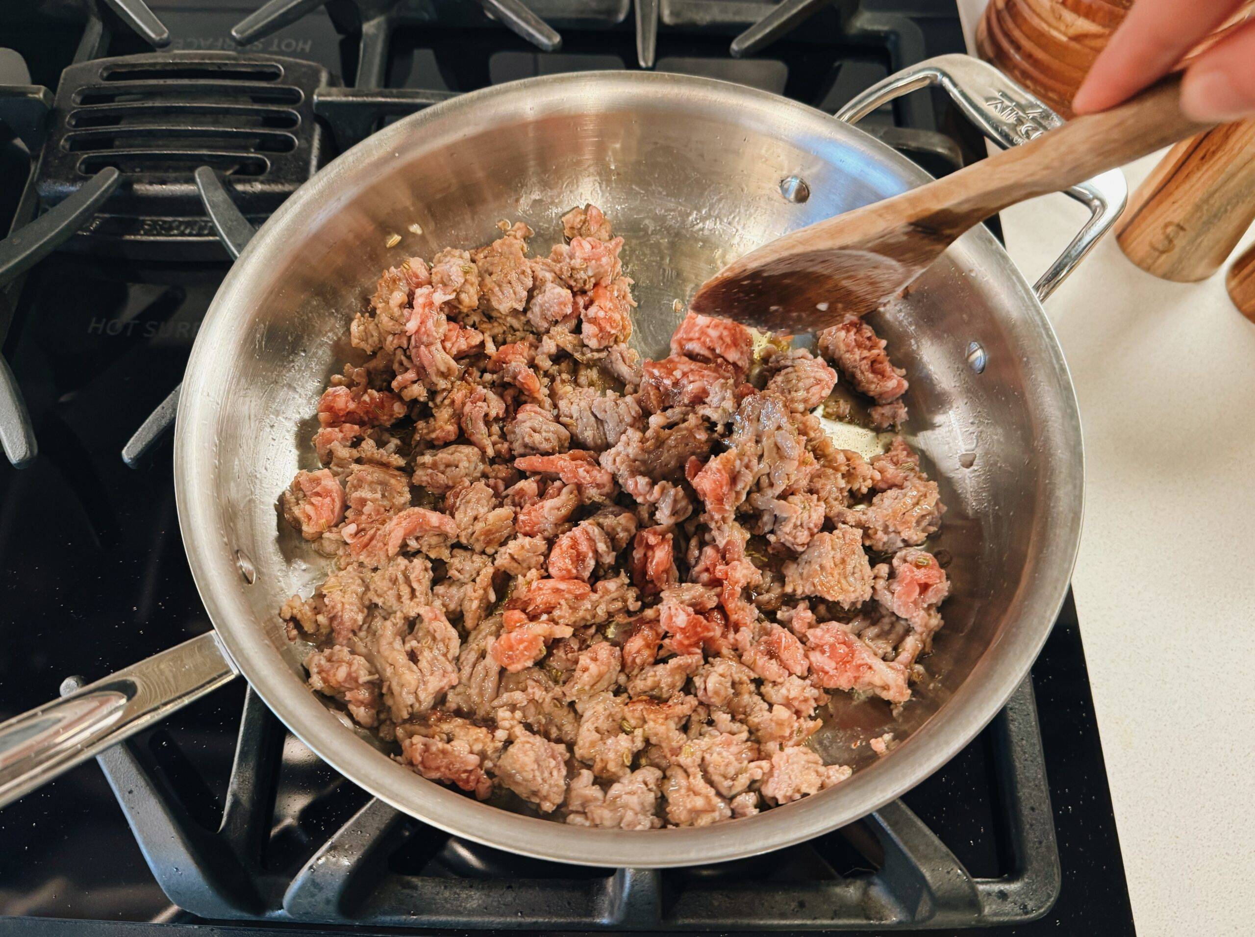 Browning Italian sausage in a pan