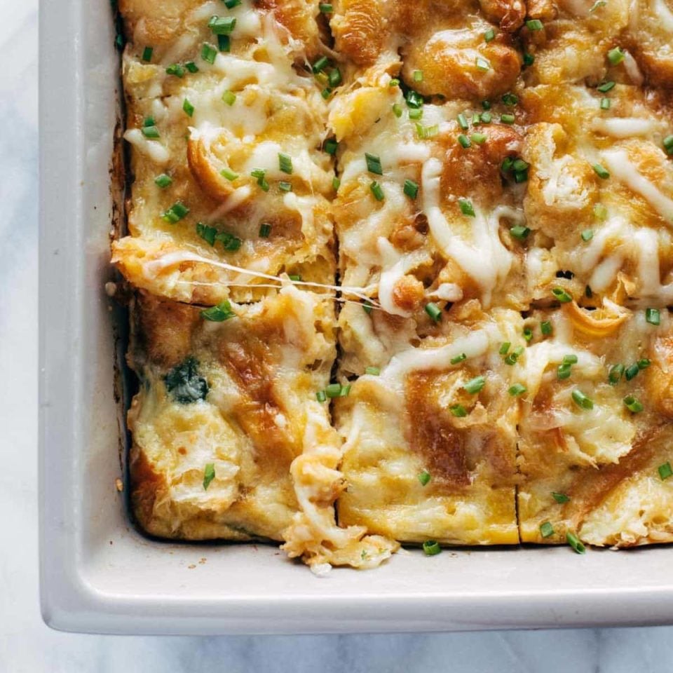 Egg and Croissant Brunch Bake in a white dish.