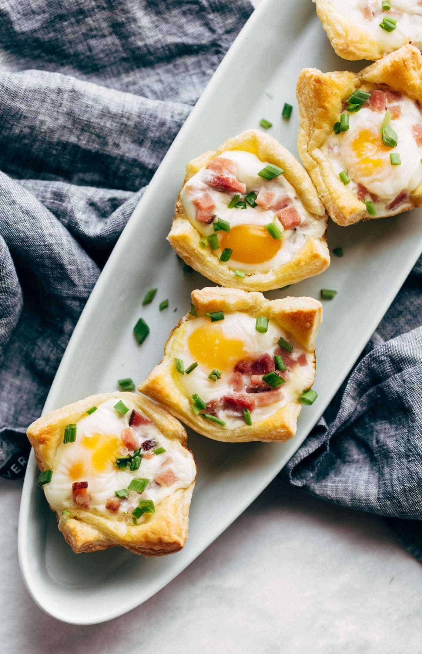Ham, Egg, and Cheese Brunch Cups arranged on serving platter.