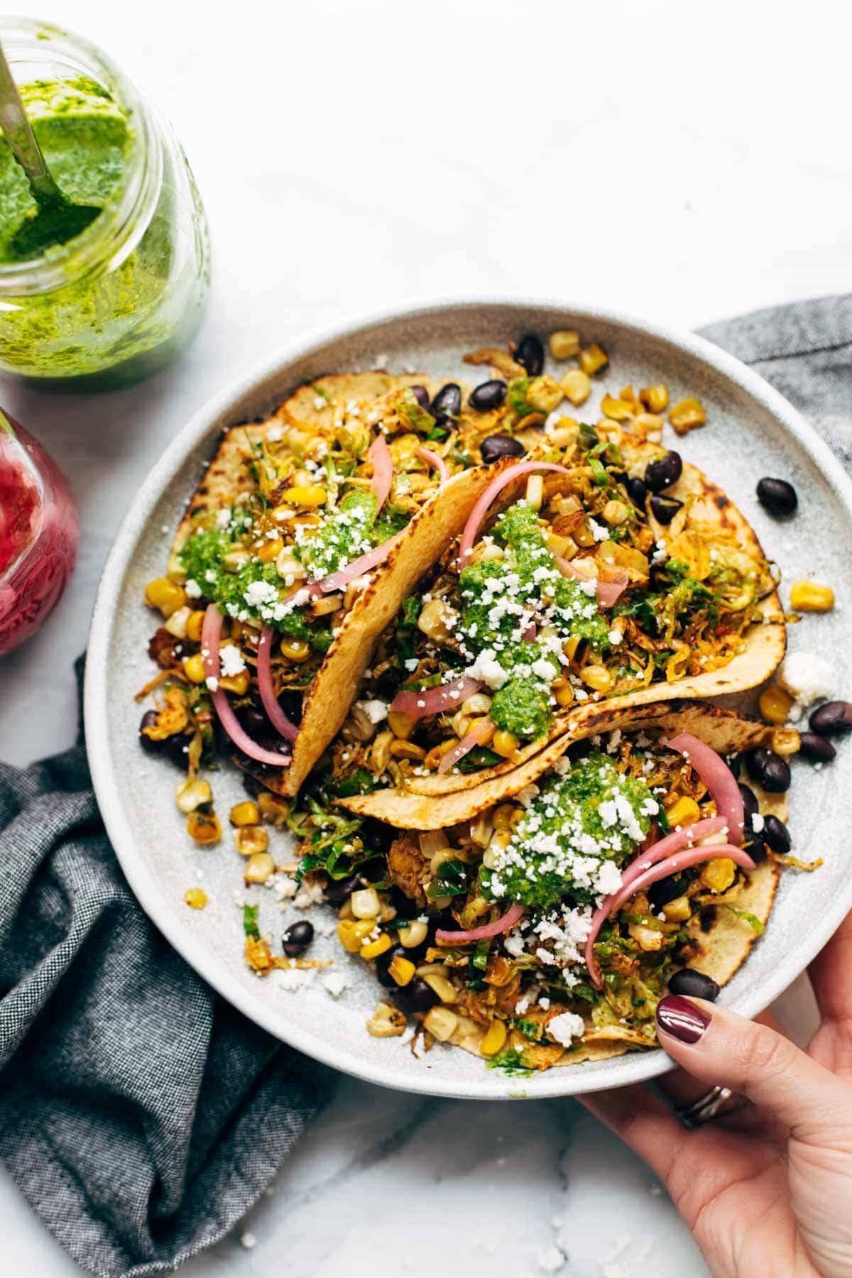 Brussels sprouts tacos on plate.