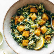 Brussels & Kale Caesar with Cheezy Garlic Croutons