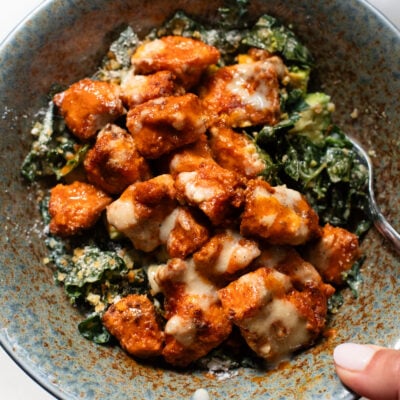 A picture of Crispy Buffalo Tofu with Caesar Salad