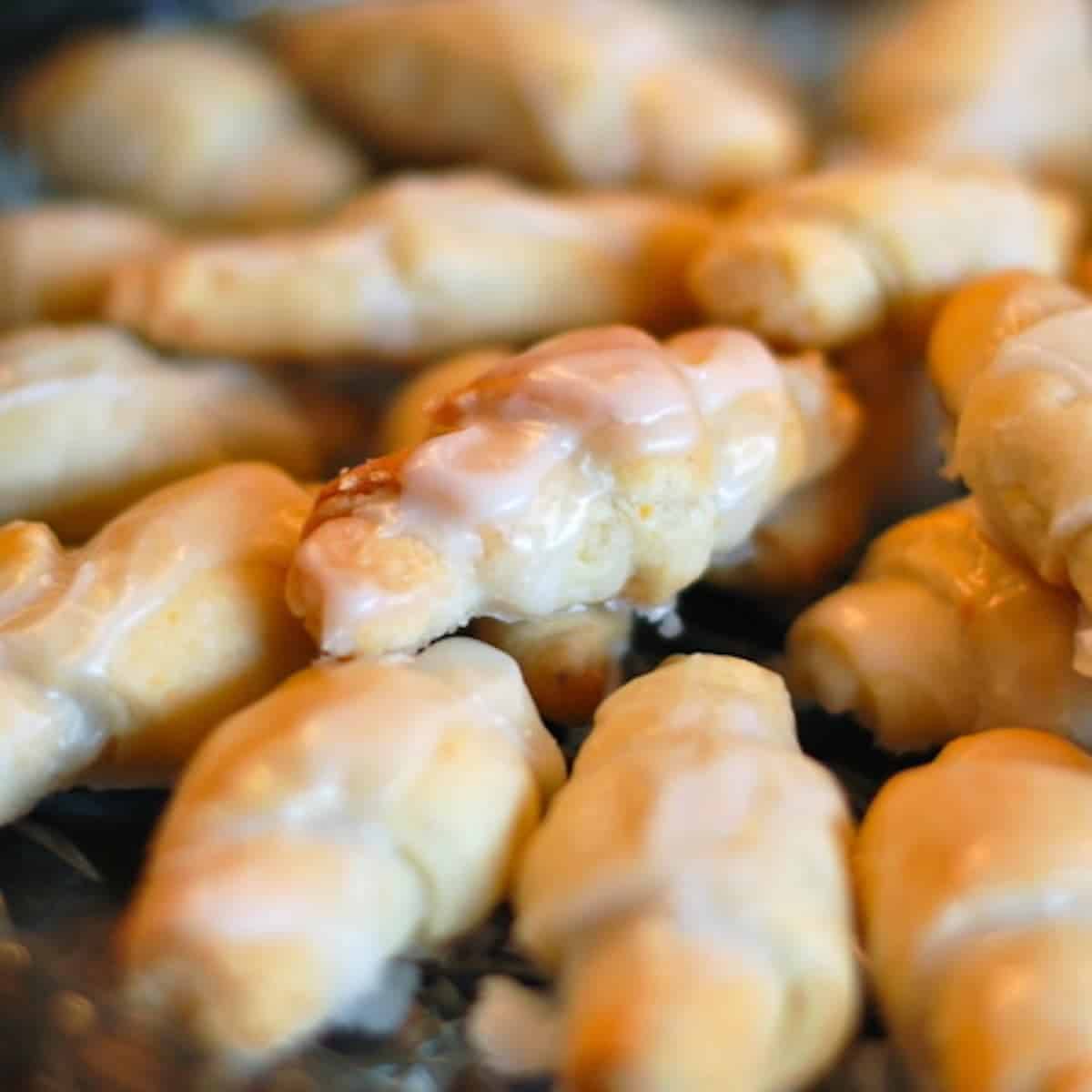 Butterhorn sweet rolls topped with a vanilla glaze.