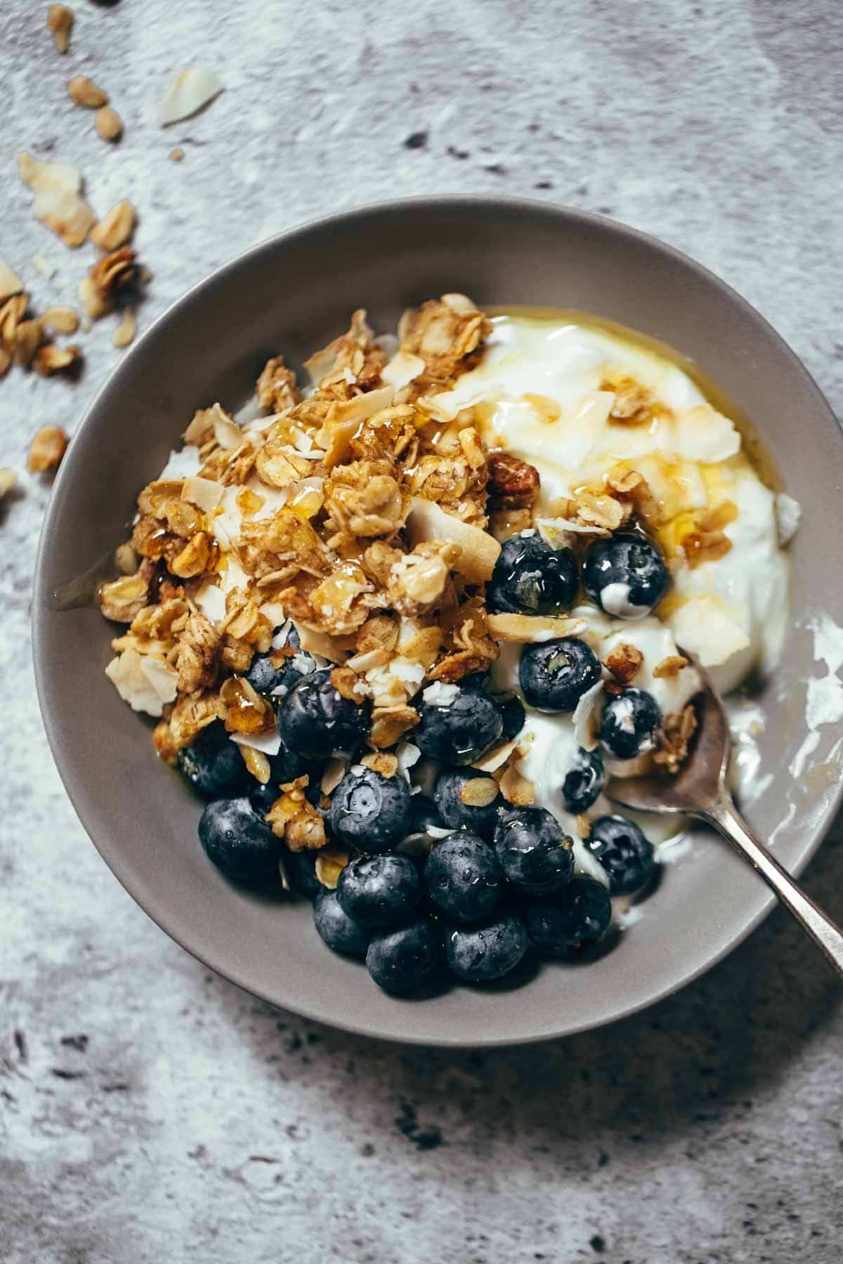Perfect granola for taking along on summer vacation for easy, real food breakfasts! Made in 30 minutes. Simple and SO good! | pinchofyum.com