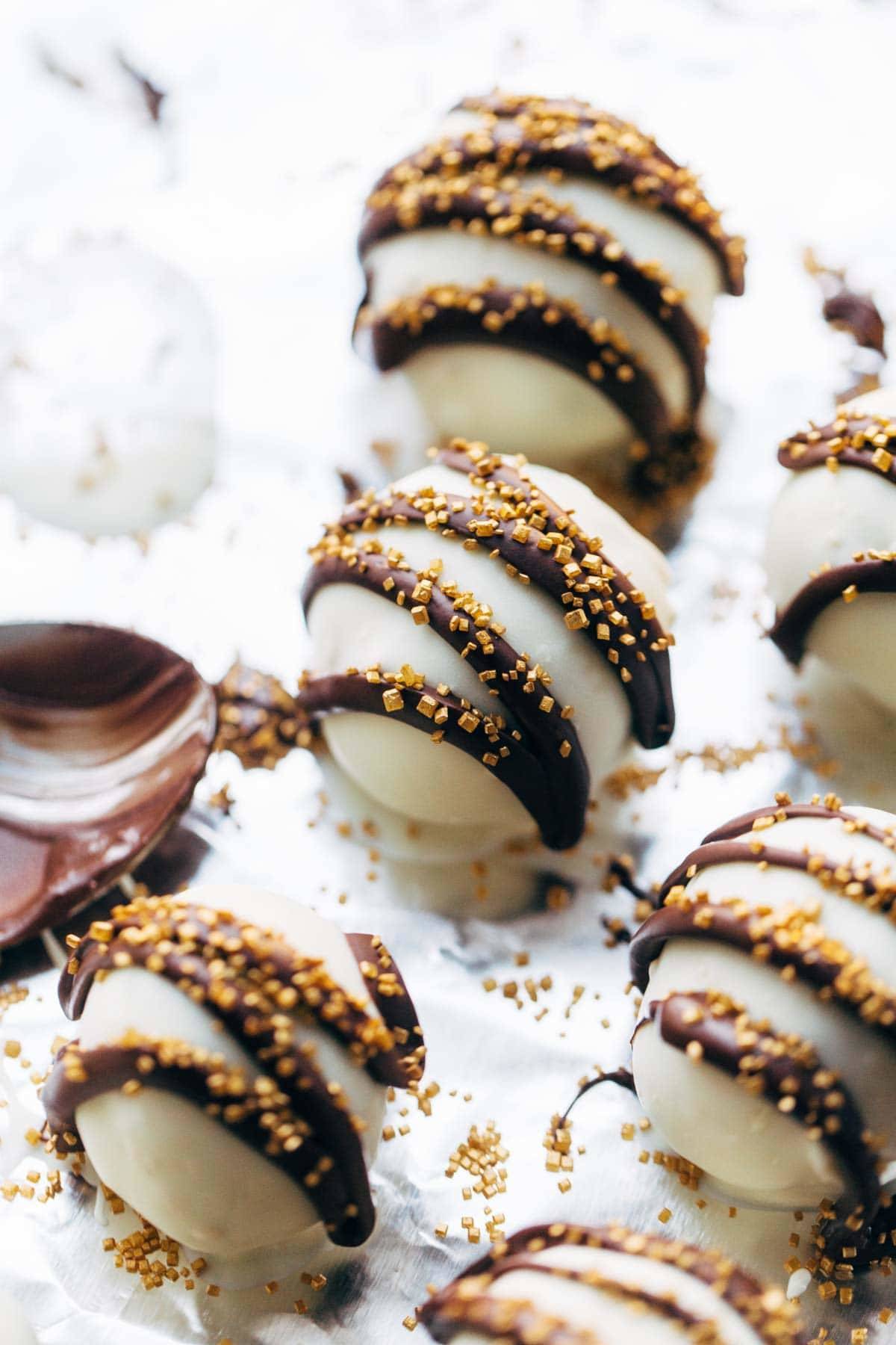 Minty Chocolate Cake Bites with chocolate drizzle and sprinkles