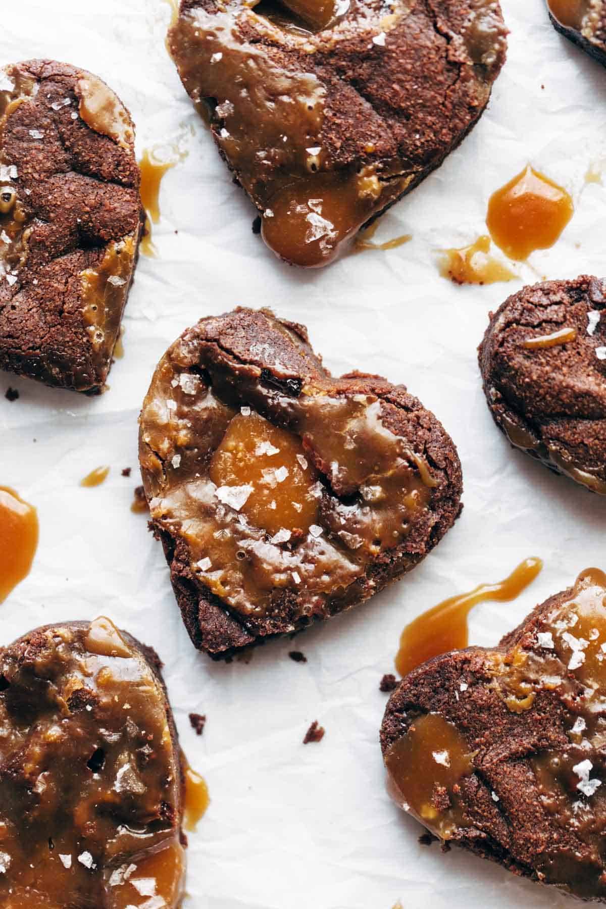 Closeup of heart-shaped salted caramel brownies.