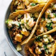 A picture of Caramelized Pork Tacos with Pineapple Salsa