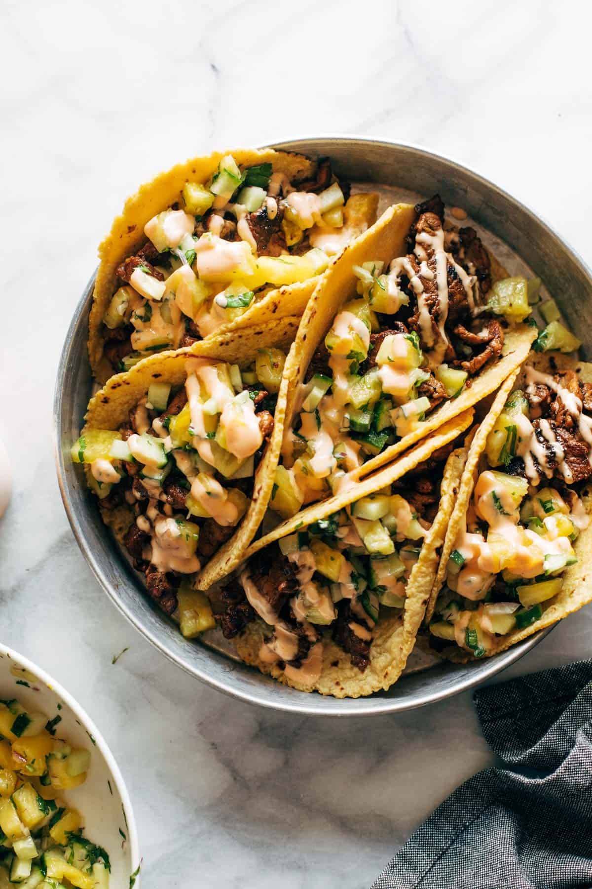 Caramelized Pork Tacos with Pineapple Salsa in a bowl.