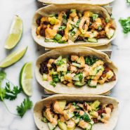 Caramelized Pork Tacos in a taco holder.