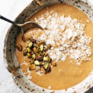 Carrot Cake Smoothie Bowl with coconut and pistachios.