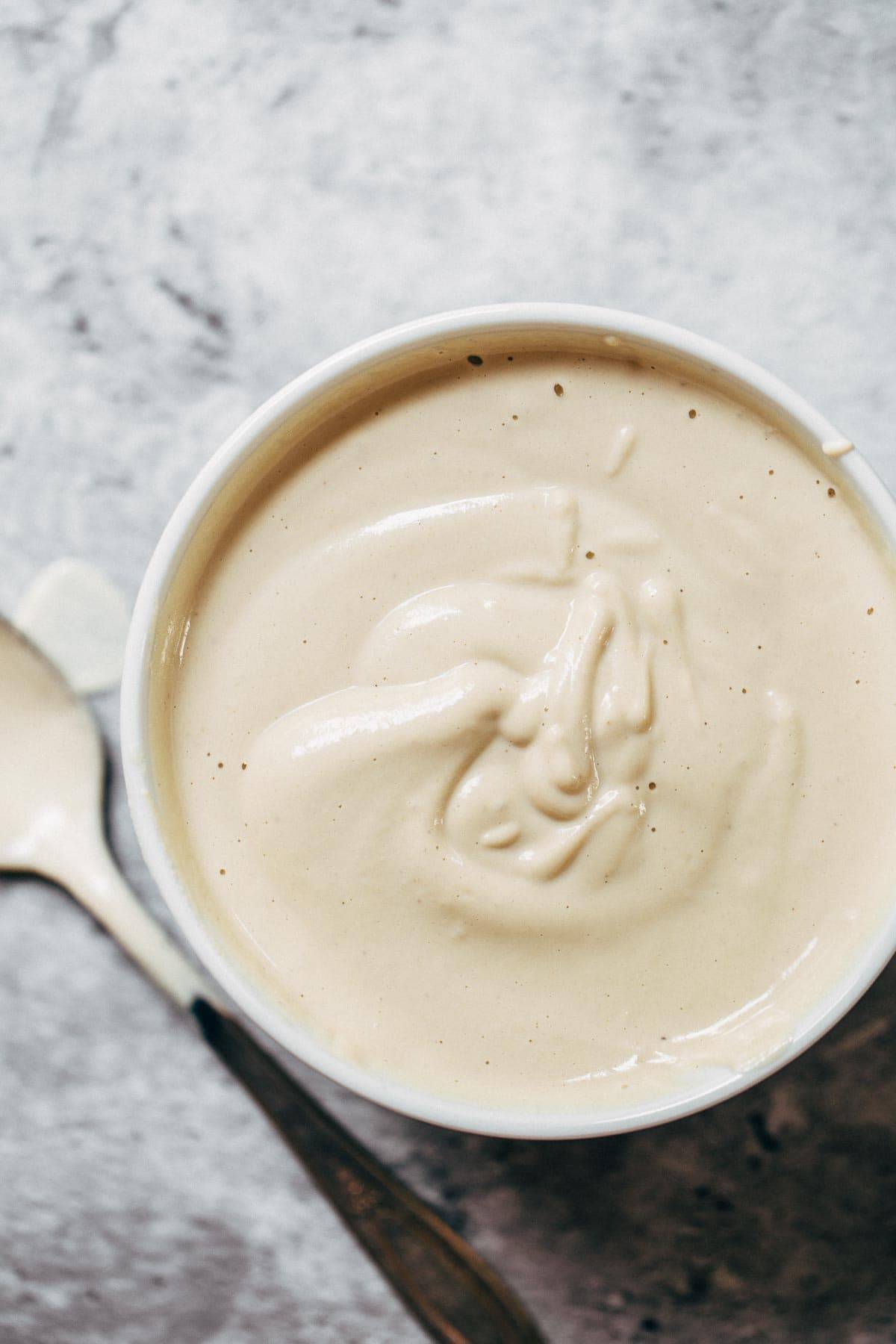 Cashew Sauce! Just four easy ingredients: cashews, garlic, salt, and water! Perfect base sauce recipe for pasta, dips, or cheesy sauce alternatives. Vegan. | pinchofyum.com