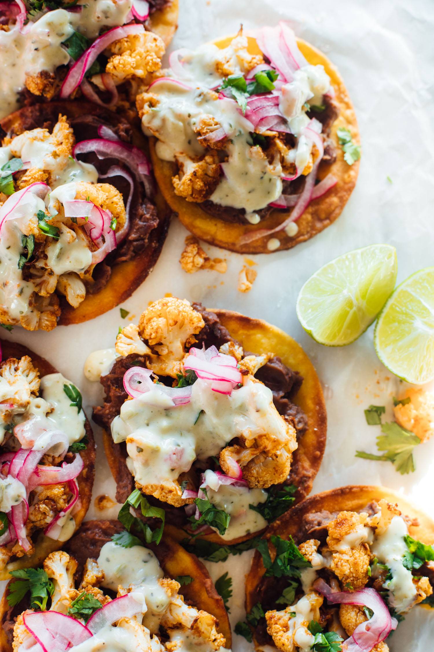 Cauliflower Black Bean Tostadas with Queso and Pickled Onion