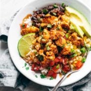 Roasted Cauliflower Burrito Bowl with toppings.