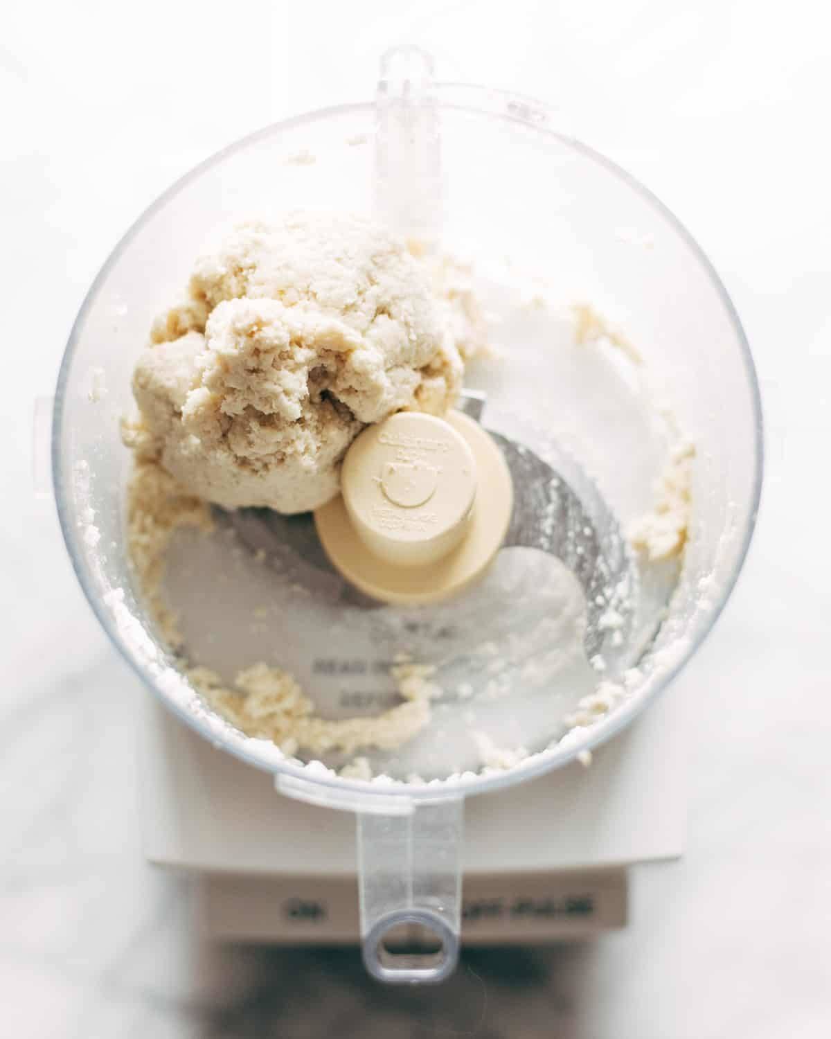 Cauliflower gnocchi dough in a food processor.