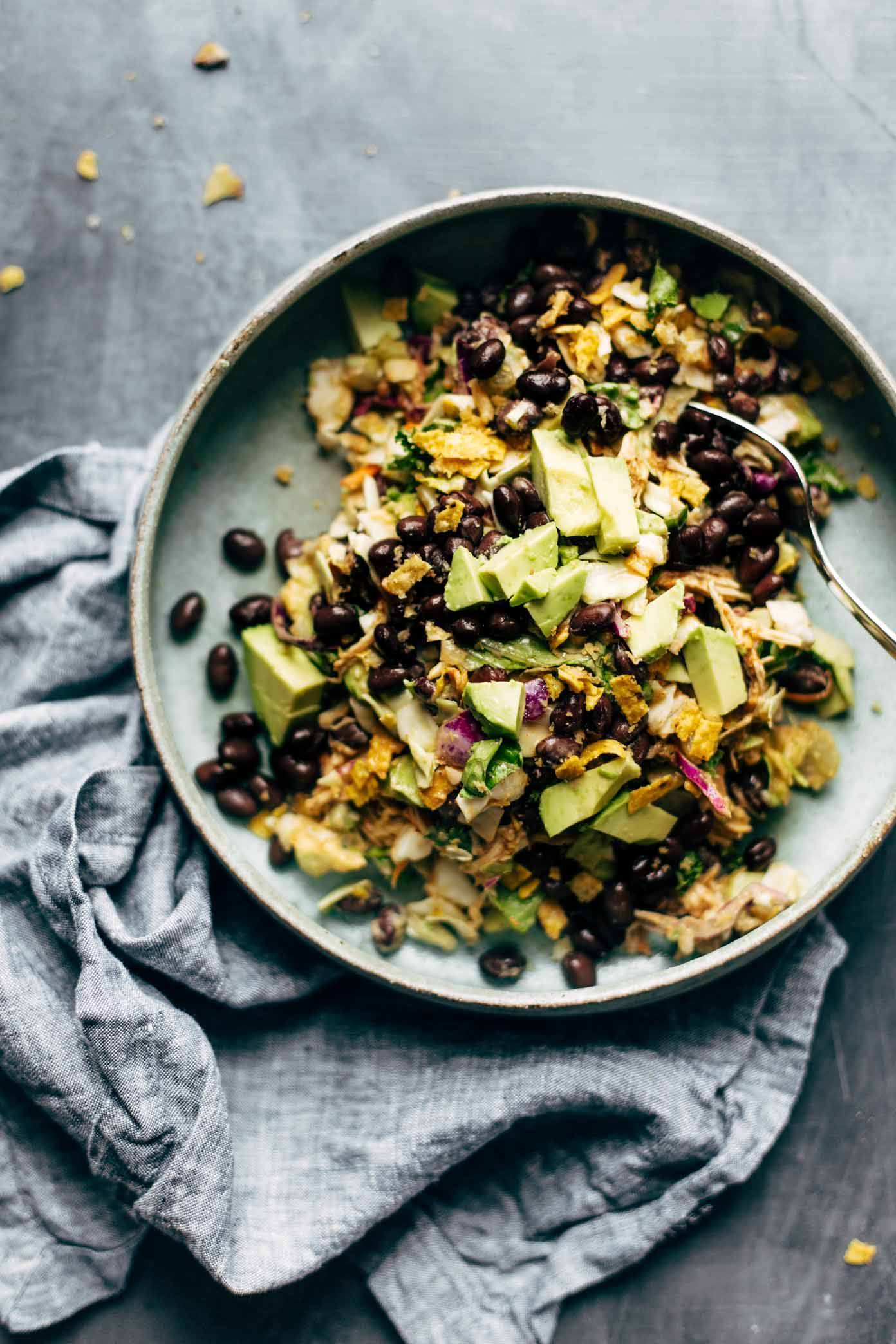 Cheater's Power Salad in a bowl with a fork and a napkin.