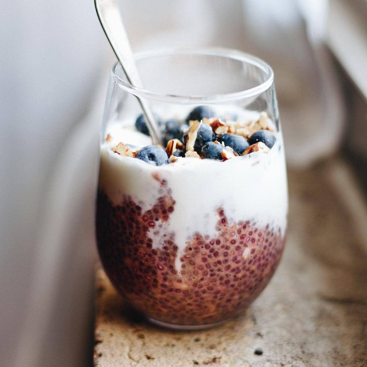 Chia Overnight Oats in a cup with a spoon.
