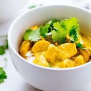 Thai Yellow Chicken Curry with Potatoes in a bowl with cilantro.