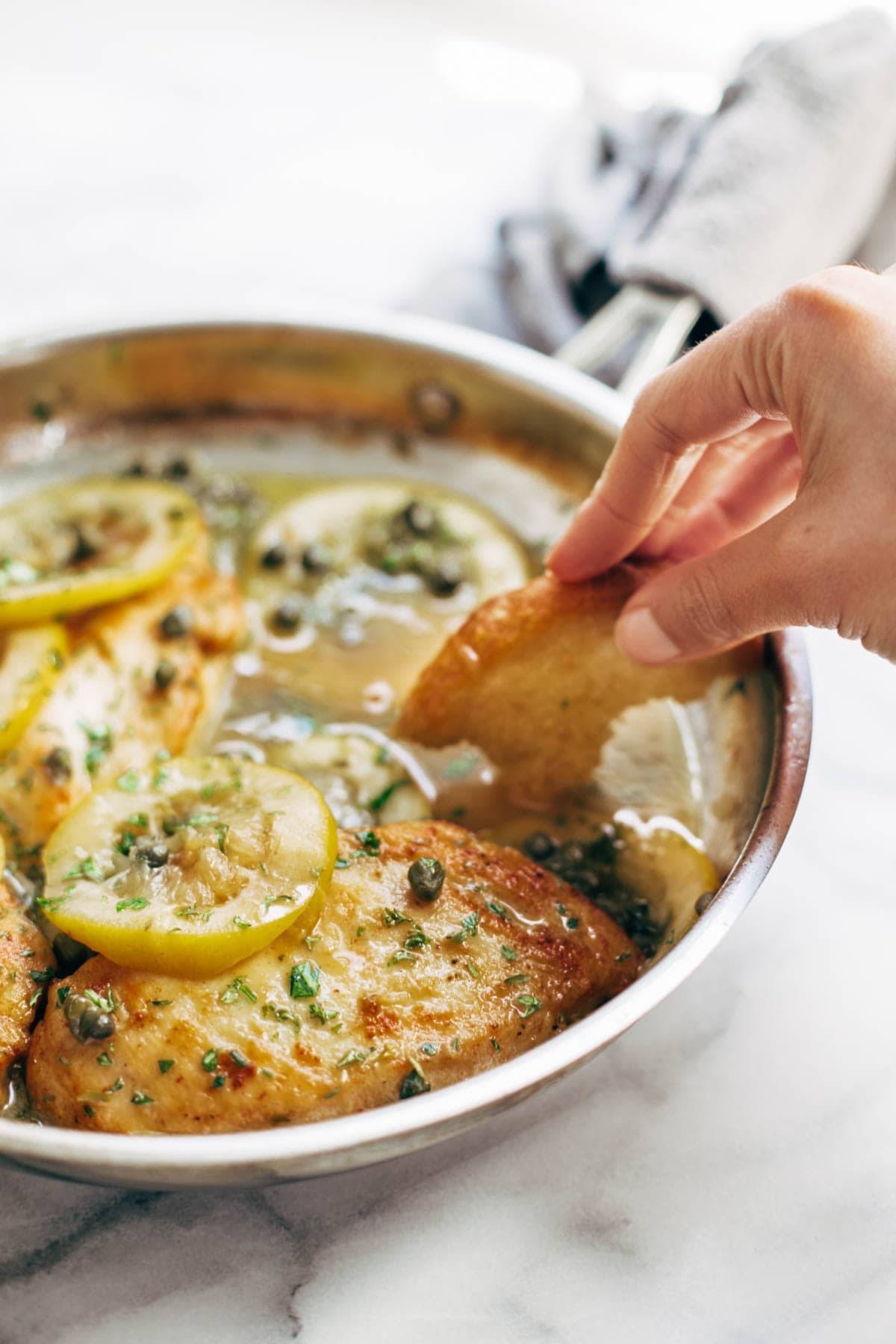 Chicken Piccata - you won't believe how easy this recipe is! Perfect with a green salad and grilled bread for soaking up all the extra sauce. | pinchofyum.com