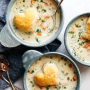 Slow Cooker Chicken Pot Pie Soup in bowl with puff pastry hearts.