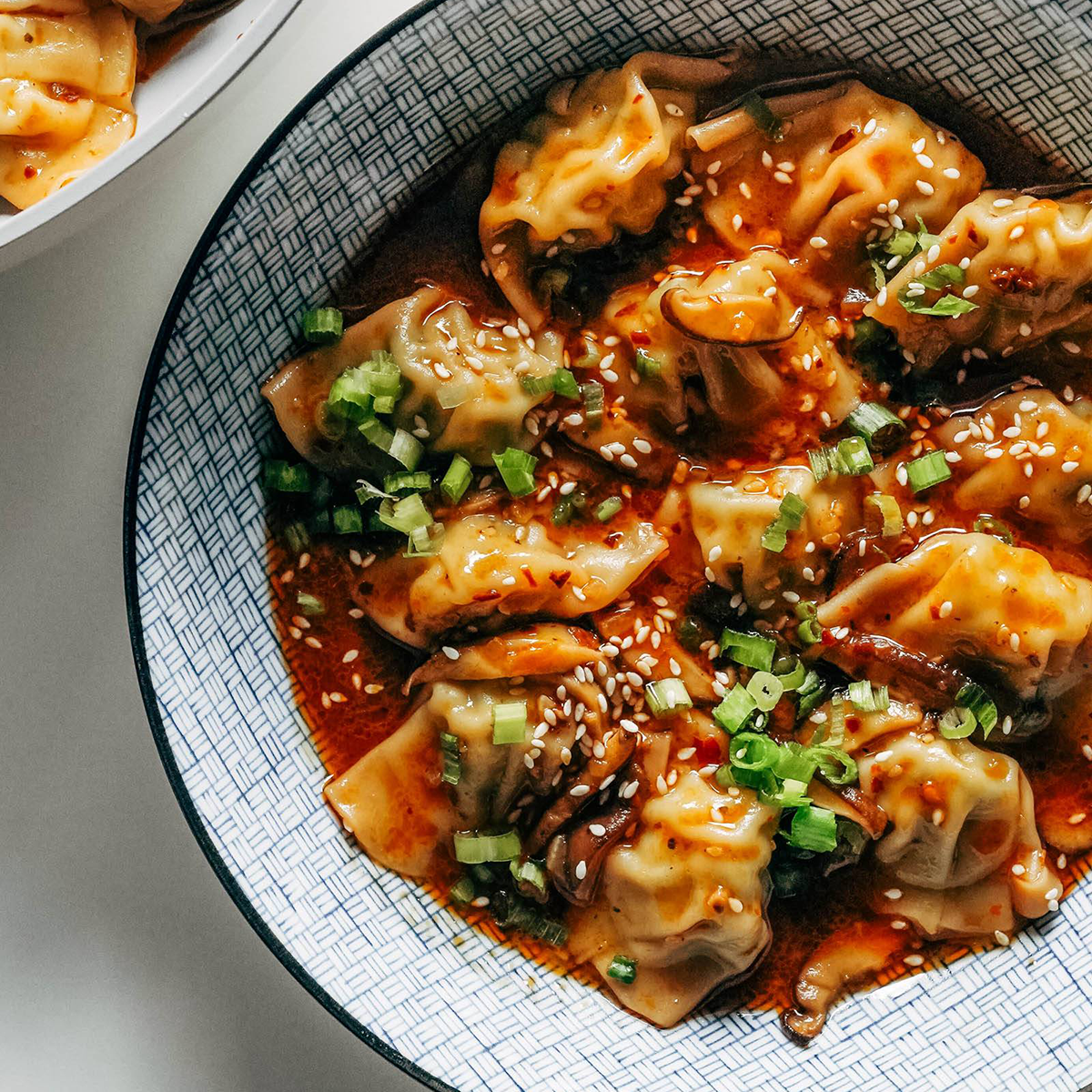 https://pinchofyum.com/wp-content/uploads/Chicken-Wontons-in-Spicy-Chili-Sauce-Square.png