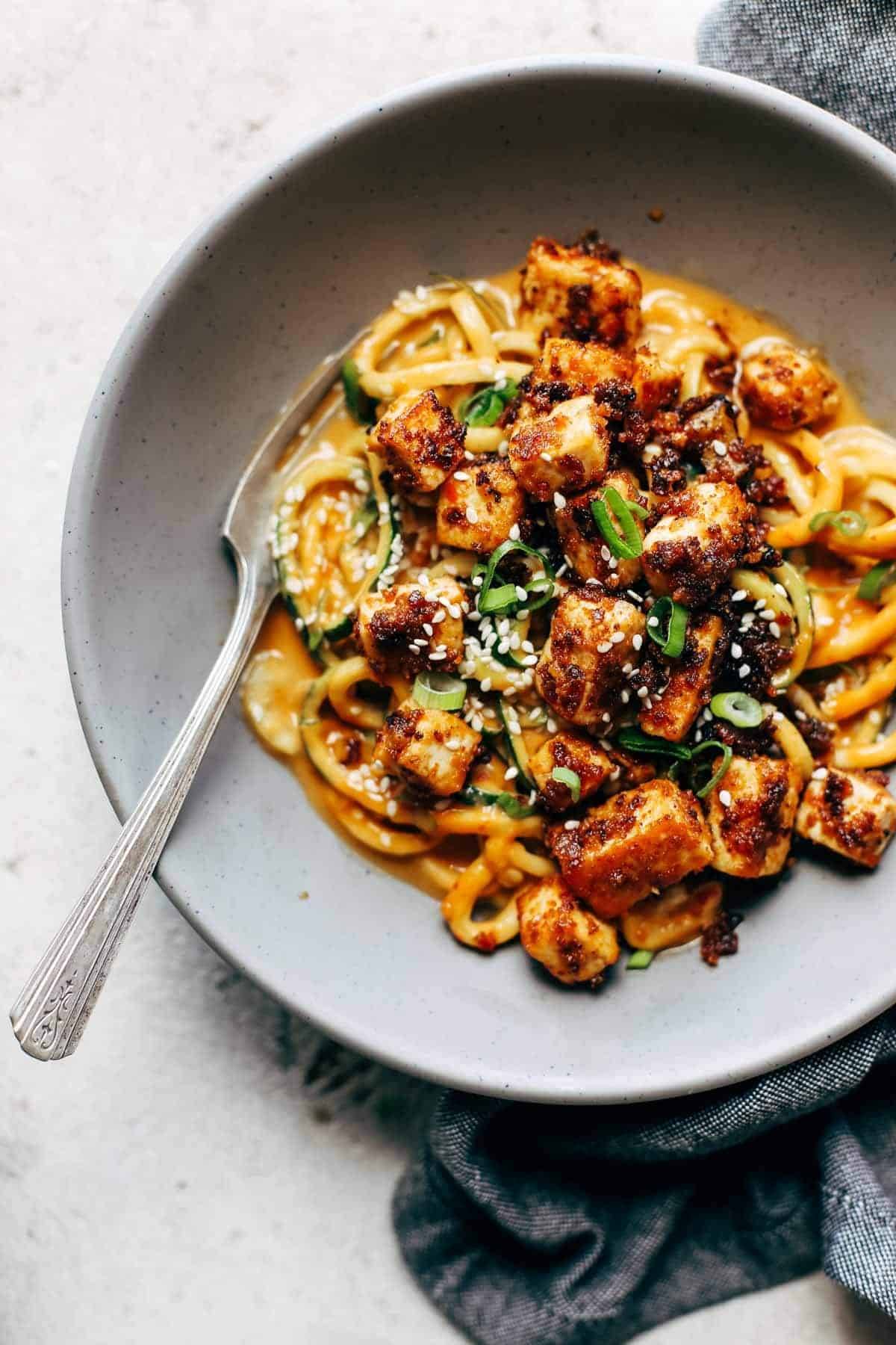 Spicy Sesame Zoodles with Crispy Tofu in bowl.
