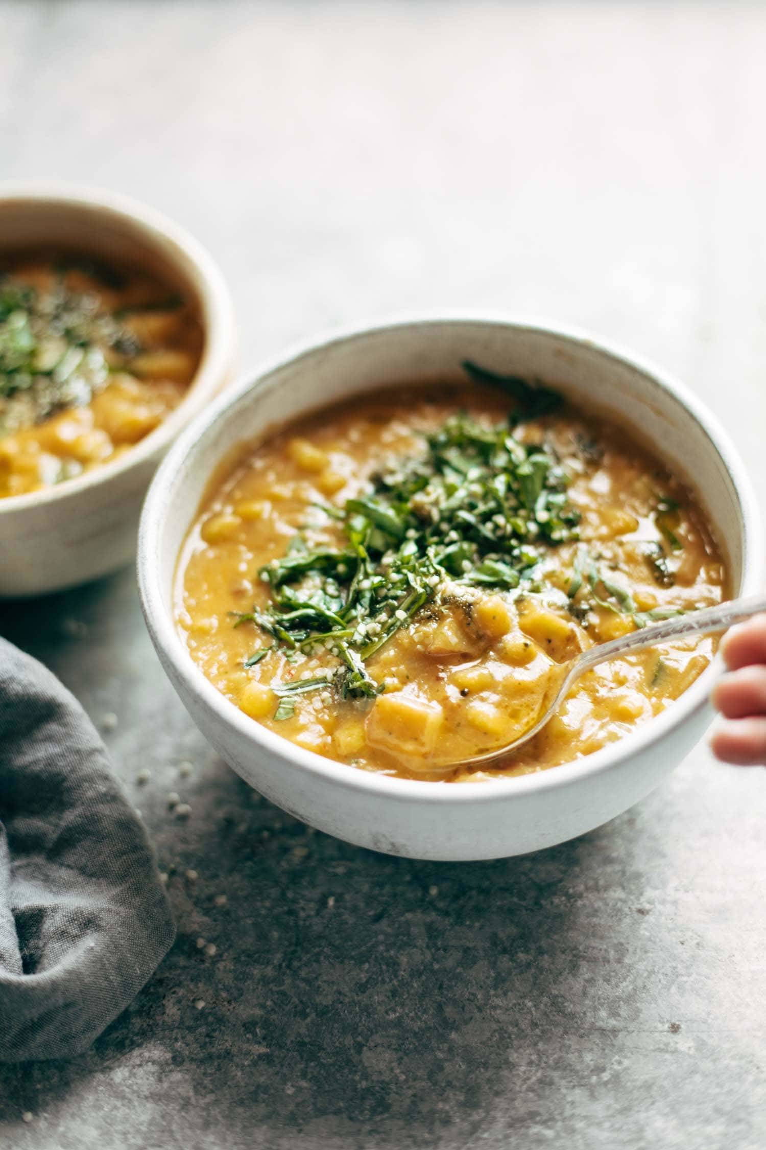 Chipotle Corn Chowder :: creamy, just a little spicy, and chock-full of summer produce like corn, zucchini, and basil. vegan, gluten free. | pinchofyum.com