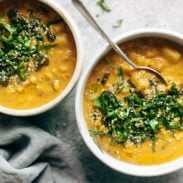 Chipotle Corn Chowder on bowls with a spoon.