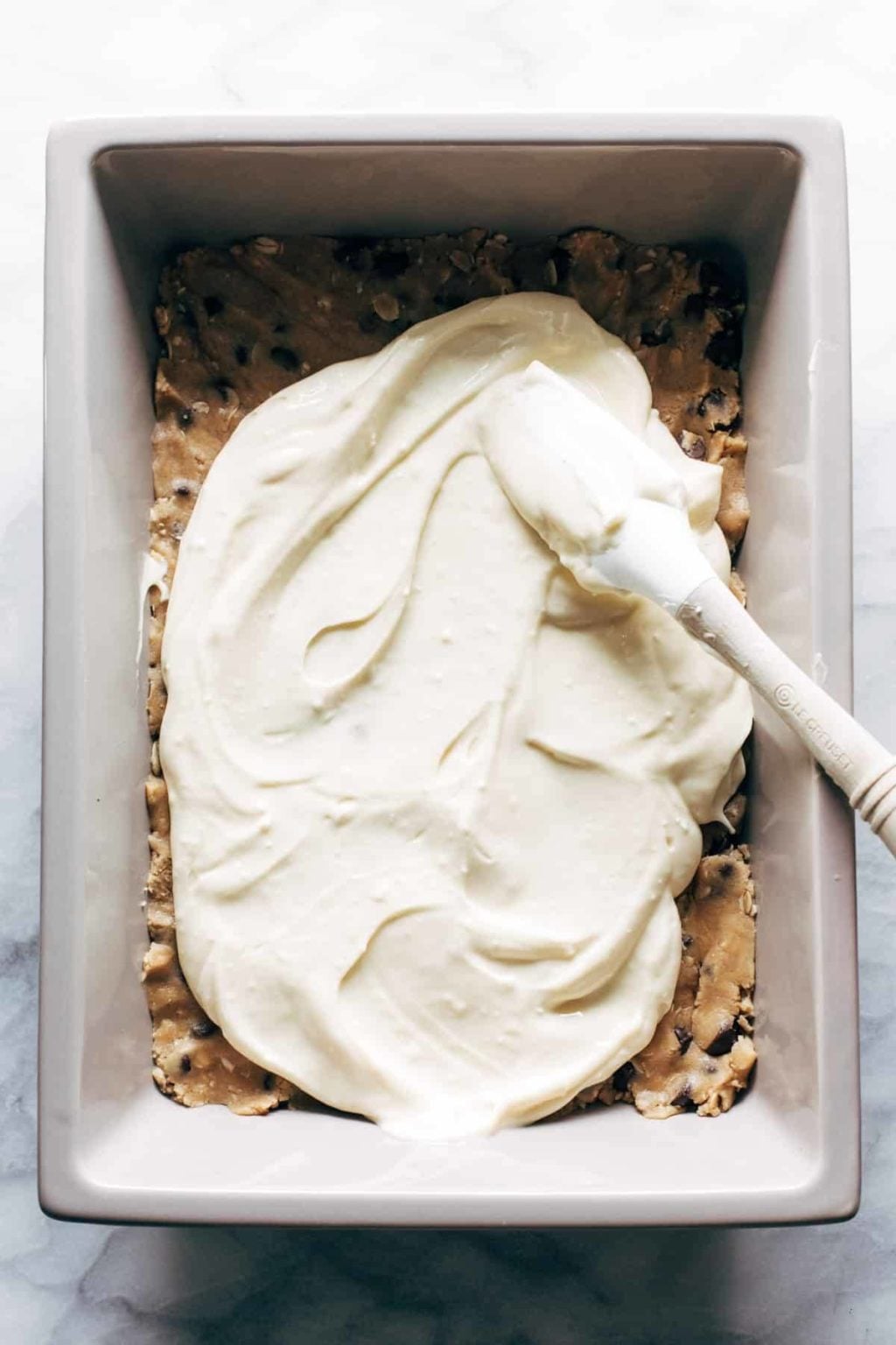 Peanut Butter Chocolate Chip Cookie Cheesecake Bars Recipe Pinch of Yum