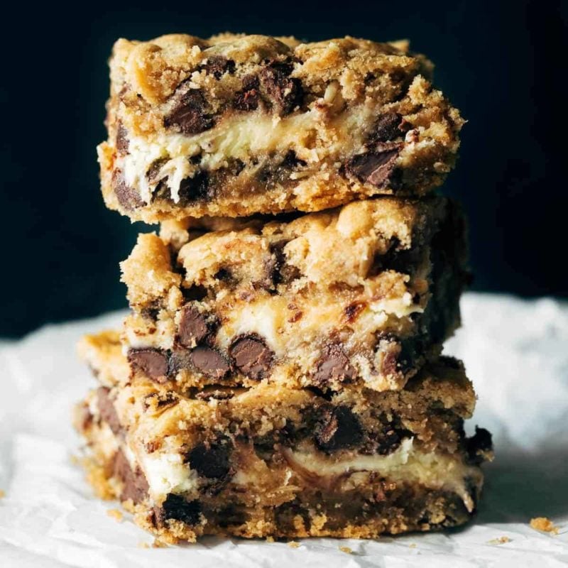 Peanut Butter Chocolate Chip Cookie Cheesecake Bars Recipe Pinch Of Yum