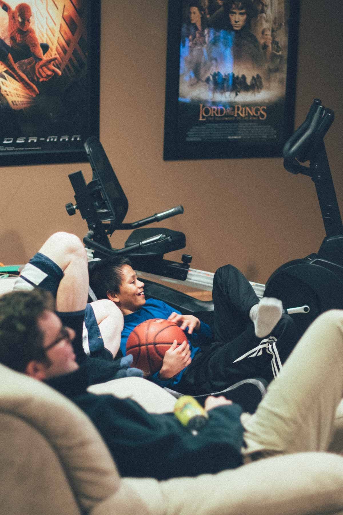 Boys in a game room.
