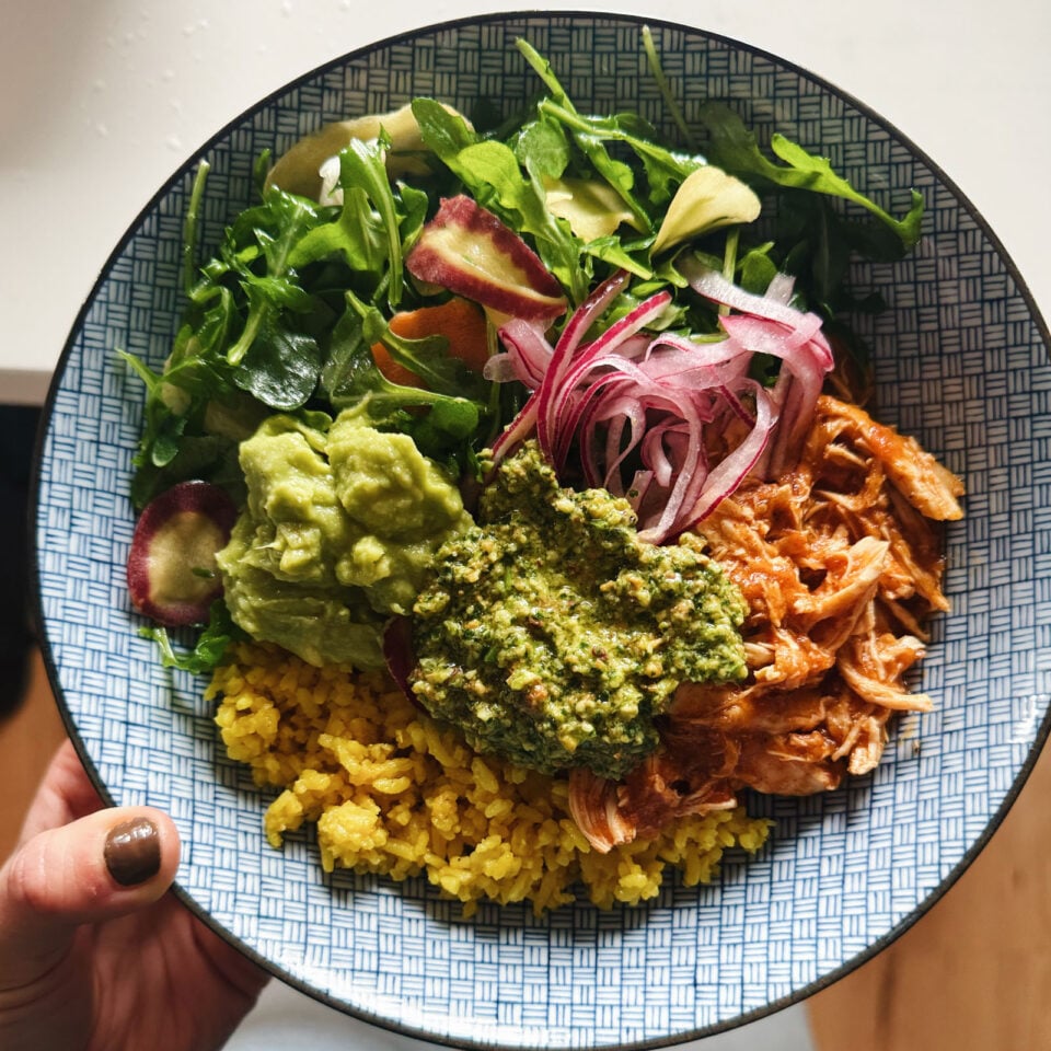 Rice bowl with chicken and cilantro pesto.